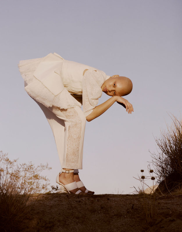 IVORY DECONSTRUCTED TAILORED JACKET WITH LACE DRAPE AND SLEEVES, PEG TROUSERS WITH LACE SIDE STRIPE AND CALICO SHOES Photography Alex Black - Alexander McQueen special, Lampoon Issue 20