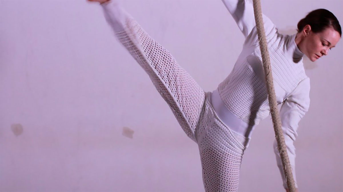 'KNITWEAR ON AIR', A SERIES OF AERIAL DANCE SEQUENCES IN THE PERFORMANCE KNIT BODYSUIT, PERFORMED BY ANNA MCDONNELL