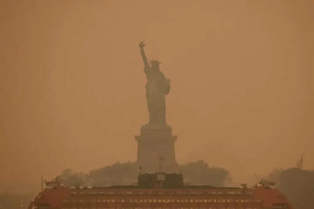 Lampoon, The Statue of Liberty is covered in haze and smoke caused by wildfires in Canada. Amr Alfiky,Reuters